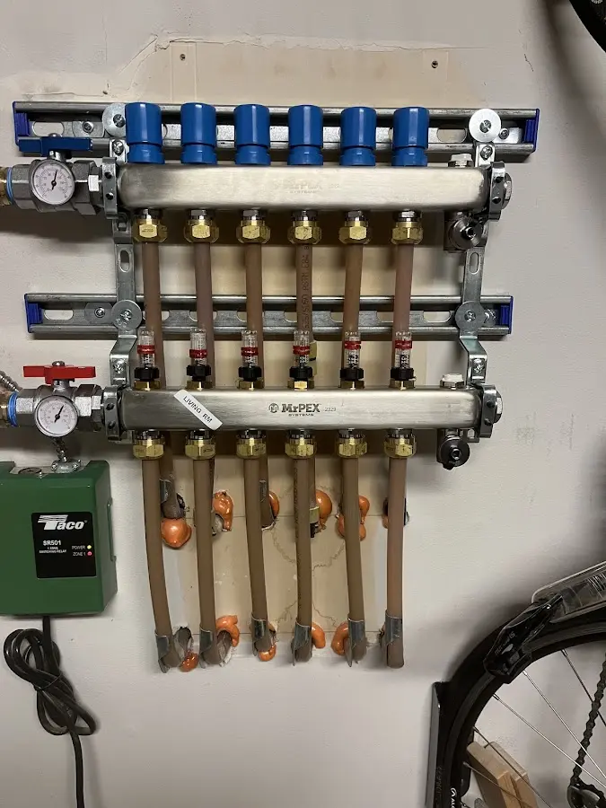 Plumber performing Water Heater Repair at a residential property in Texas